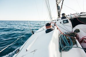 Deck of professional racing yacht leaning in wind